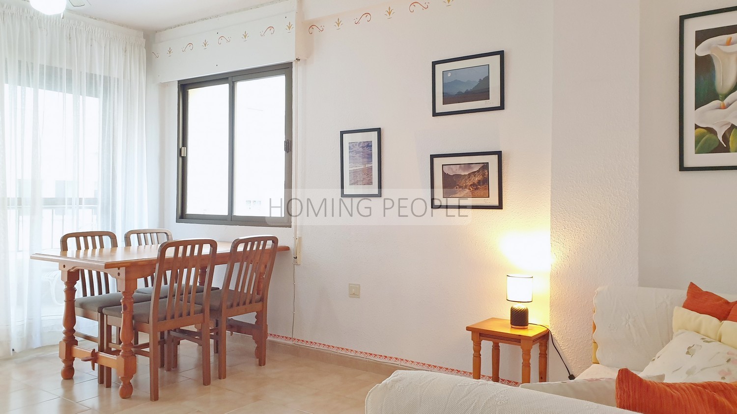 Bright apartment in seafront building with swimming pool and parking space