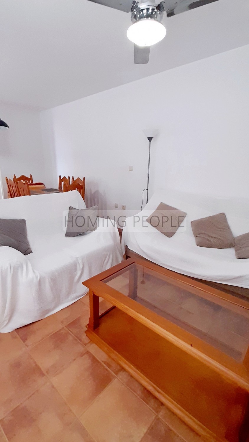 Two-storey semi-detached house with private garage and communal pool