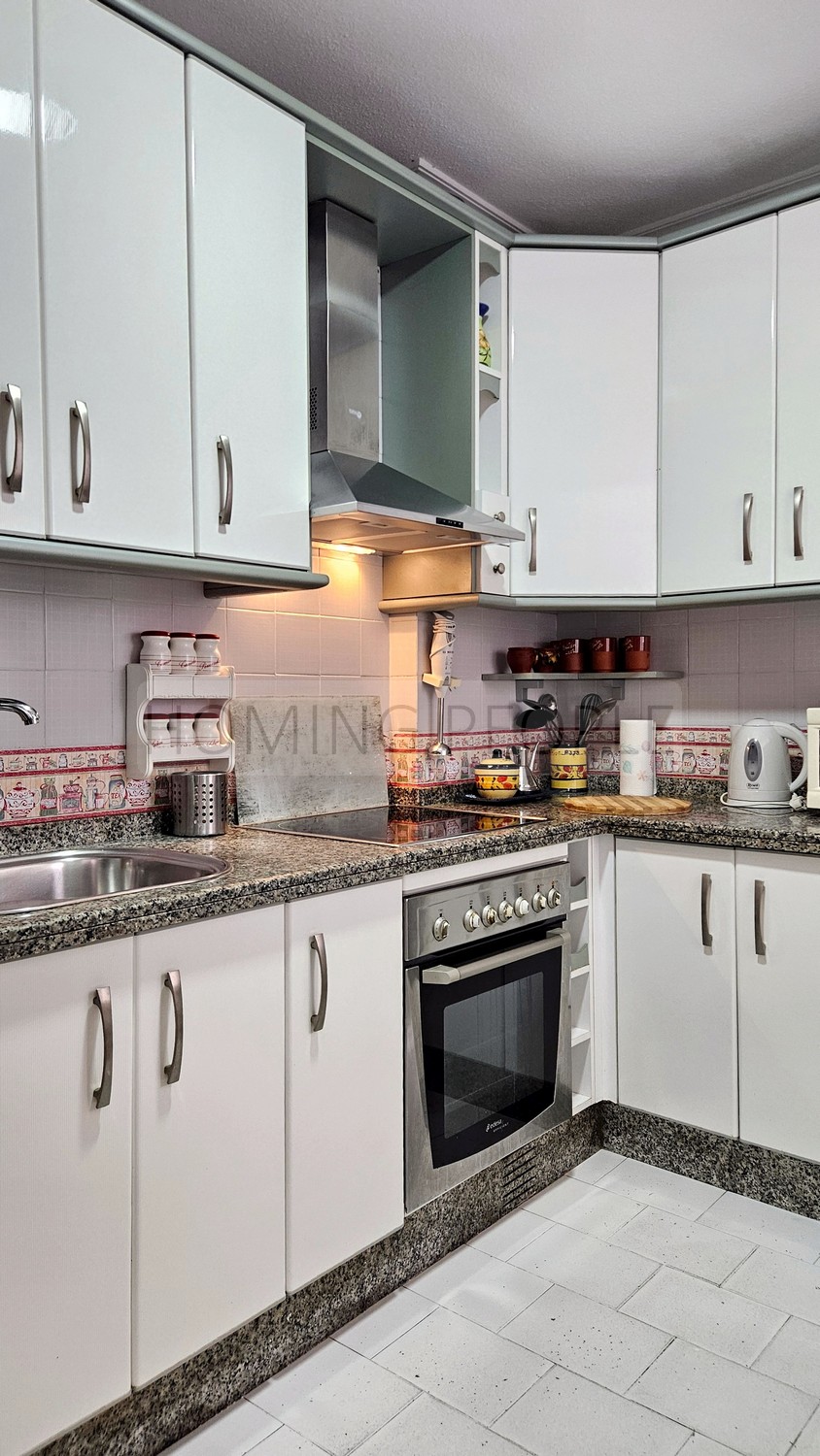 Central flat: Opposite the municipal market, with terrace and communal swimming pool