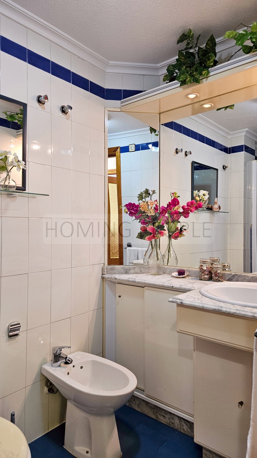 Central flat: Opposite the municipal market, with terrace and communal swimming pool