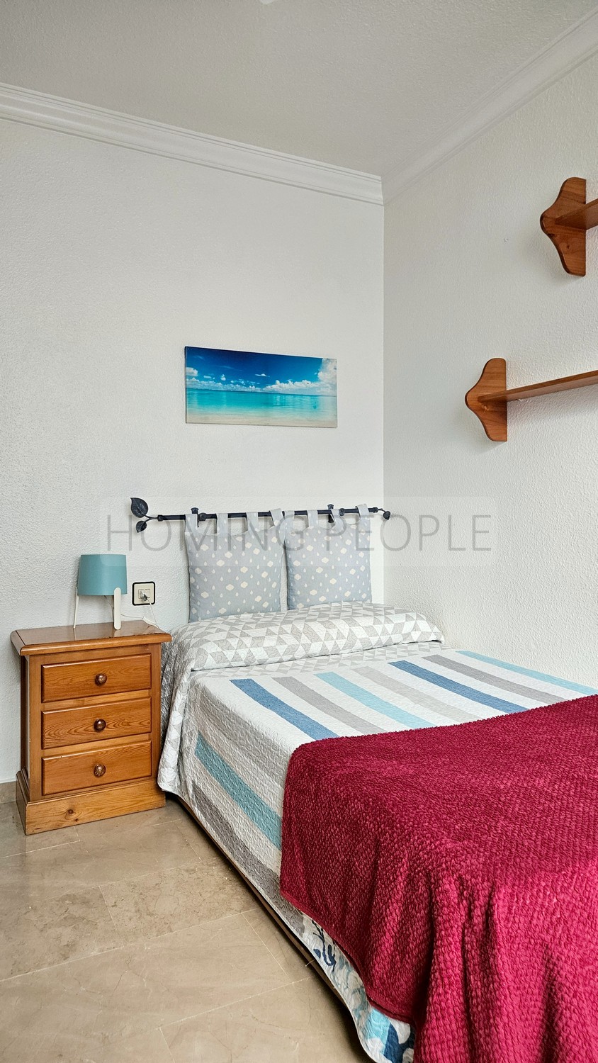 Central flat: Opposite the municipal market, with terrace and communal swimming pool