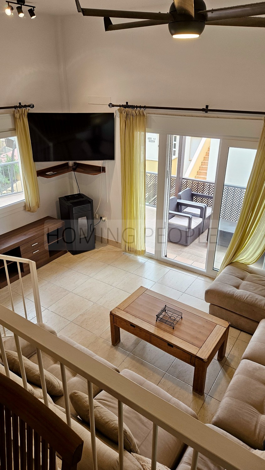 Duplex with large terrace and communal swimming pools