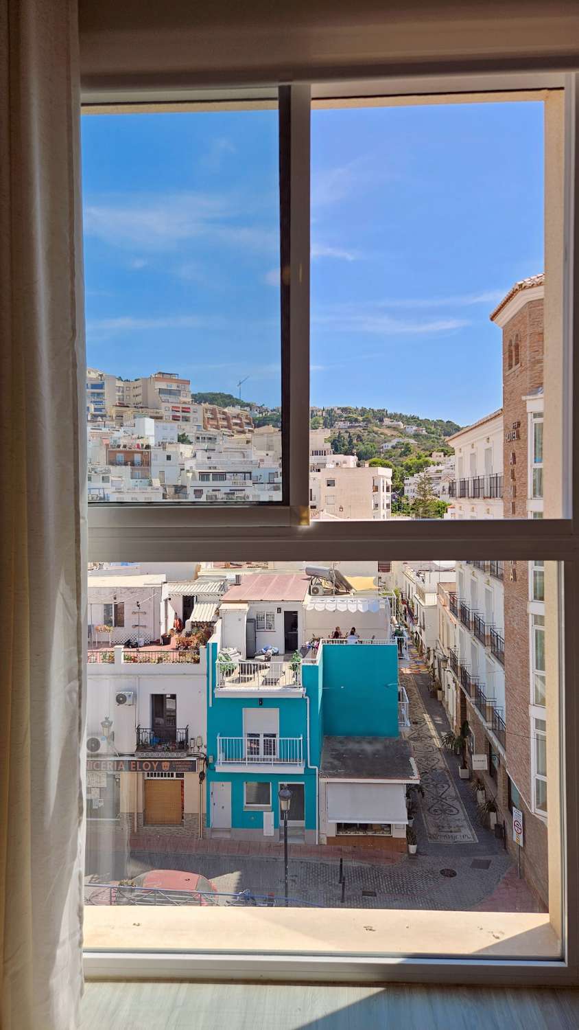 A well-appointed flat in the city centre... & a terrace with views to the sea and the old town!
