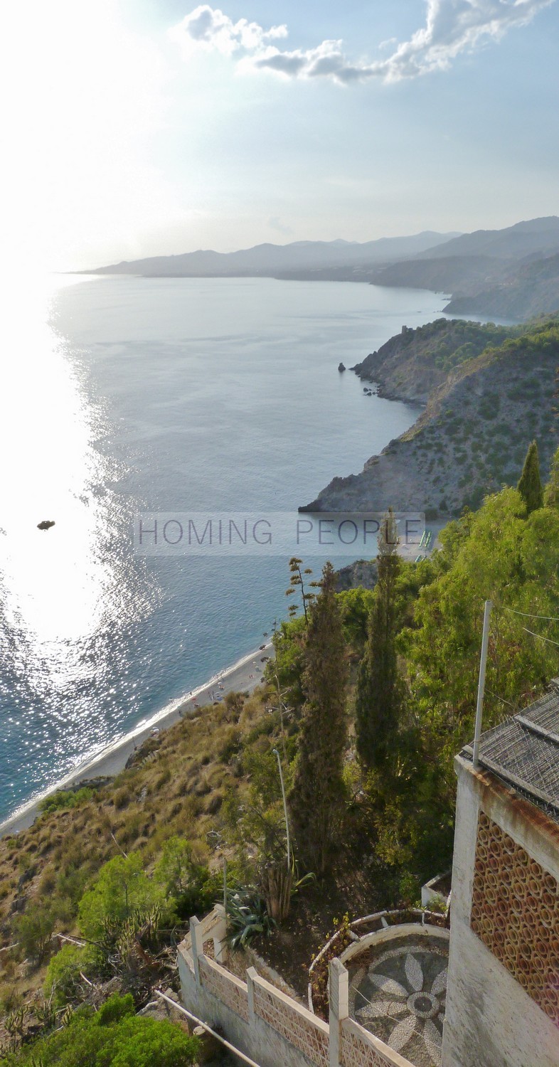 Parkland beachfront cliffs near neighbors