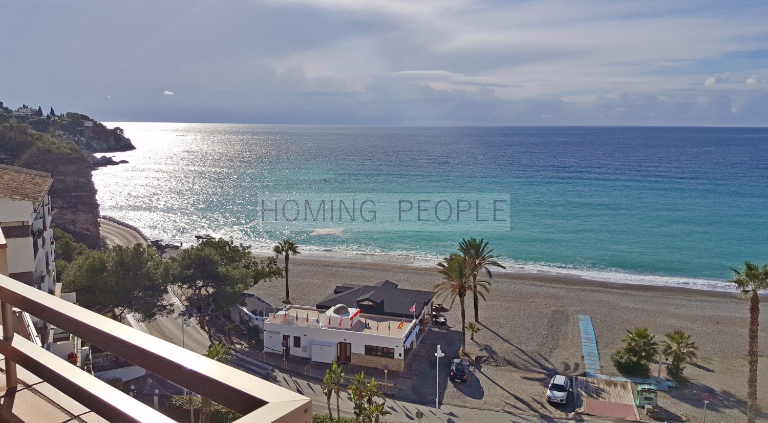 Ático en 1ª línea de playa con terraza y preciosas vistas a la bahía